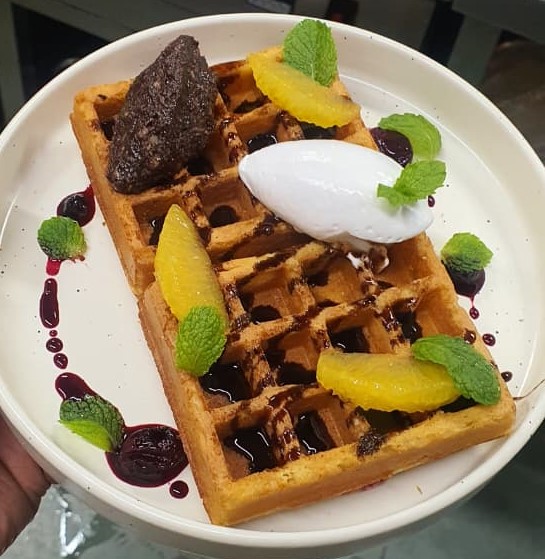 Chocolate fudge waffle · orange · berry