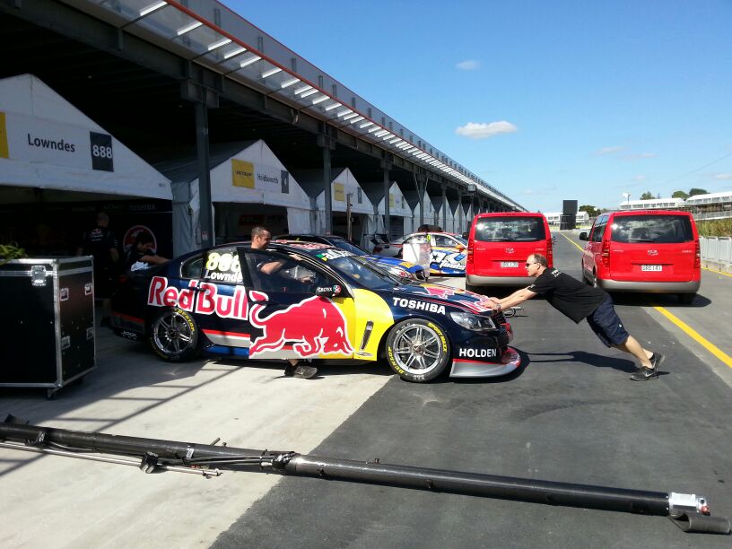 Red Bull Holden being pushed through pit lane
